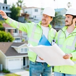 ADU Now LA construction experts reviewing ADU design plans at a Los Angeles property site